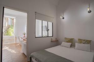 Appartements Appartement 55m² - 2/4 personnes en centre ville : photos des chambres