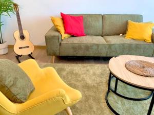 Appartements Lumineux et cosy, avec parking, 2 mn gare, 2mn Muse, 5mn centre : photos des chambres