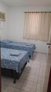 Quarto em Apto ao lado Shopping