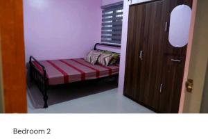 Lax Uno 2 bedroom home with Parking, Wi-Fi, NetFlix and Airconditioned Rooms and Shower Heater