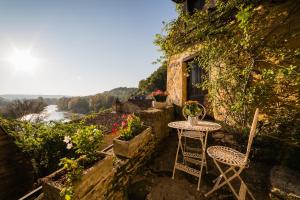 Maisons de vacances Heart of BEYNAC Your typical house with a magical view over river : photos des chambres