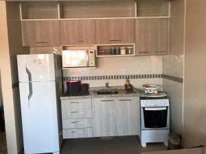 JK próximo ao mar com piscina em Capão Novo