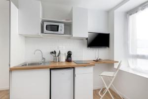 Appartements Paimpont - Agreable studio neuf, 5 min tramway, tout equipe, proche centre : photos des chambres