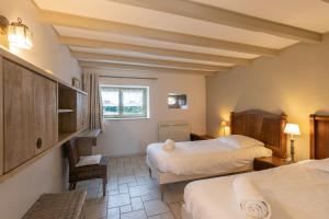 Maisons de vacances Gite Le Foineau - Maison avec Piscine : photos des chambres