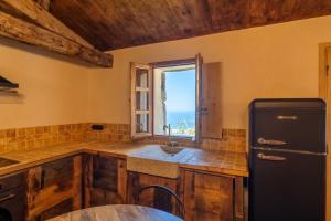 Villas A VIGNA - CASEDDU PETRU GHJASEPPU vue mer et piscine : photos des chambres