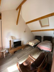 B&B / Chambres d'hotes Les Crinieres En Brie : photos des chambres