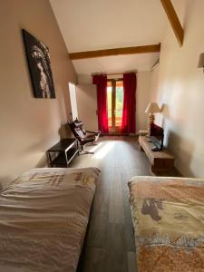 B&B / Chambres d'hotes Les Crinieres En Brie : photos des chambres