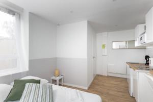 Appartements Studio Roi Arthur, neuf et equipe, proche centre et tramway : photos des chambres