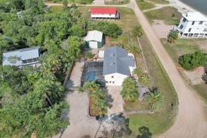 Pet-Friendly Bay View Home w Screened Pool Near Lighthouse