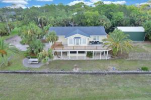 Pet-Friendly Bay View Home w Screened Pool Near Lighthouse
