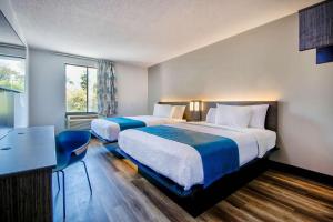 Queen Room with Two Queen Beds - Non-Smoking room in Value Inn Jeffersonville