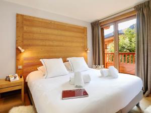 Chalets Chalet de luxe au coeur de Courchevel Le Praz avec sauna et acces direct aux 3 Vallees - FR-1-575-149 : photos des chambres