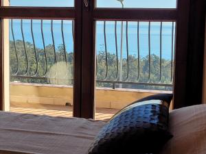 Villas Superbe Villa, incroyable vue mer, avec piscine privative a Solenzara : photos des chambres