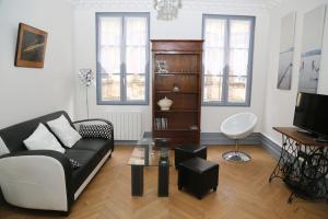 Appartements Appartement Bourgeois : photos des chambres