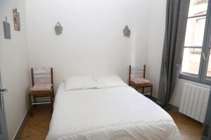 Appartements Appartement Bourgeois : photos des chambres