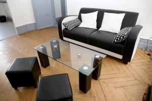 Appartements Appartement Bourgeois : photos des chambres