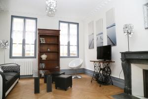 Appartements Appartement Bourgeois : photos des chambres