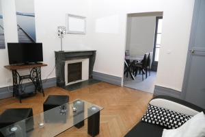 Appartements Appartement Bourgeois : photos des chambres