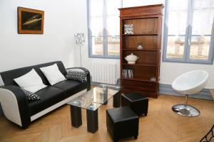 Appartements Appartement Bourgeois : photos des chambres