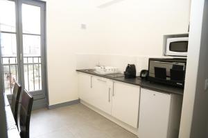 Appartements Appartement Bourgeois : photos des chambres