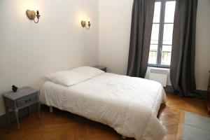 Appartements Appartement Bourgeois : photos des chambres