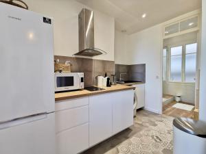 Appartements LE FOCH by Booking Guys : photos des chambres