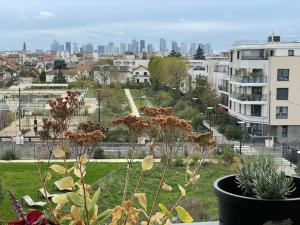 Appartements Superbe appart avec vue panoramique sur La Defense : photos des chambres