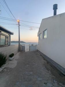 Casa pé na areia Ponta do Papagaio