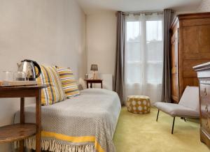 Hotels Hotel La Roseraie : photos des chambres
