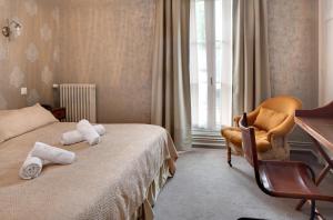 Hotels Hotel La Roseraie : photos des chambres