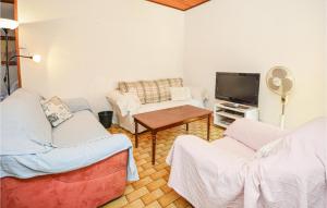 Nice apartment in St Florent s, Auzonnet with 2 Bedrooms, WiFi and Outdoor swimming pool