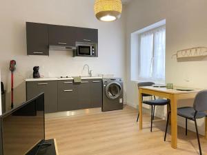 Appartements Studio Le marengo dans le centre de St Etienne : photos des chambres