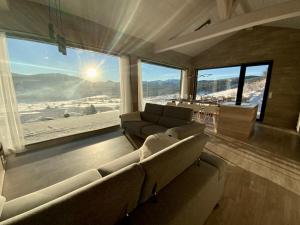 Chalets Artik chalet avec vue a 180 degres et piscine : photos des chambres