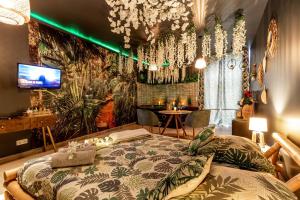 Love hotels Sweet Uni'vert Jacuzzi : photos des chambres