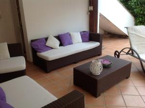 Three-Bedroom House with Partial Sea view room in Residence Baia Delle Palme