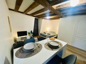 Appartements Aux pieds du Vieux-Mans : Joli Studio Cosy : photos des chambres