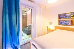 Appartements appart'hotel le 8 avec Spa&Jacuzzi : photos des chambres