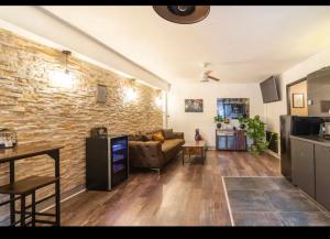 Appartements appart'hotel le 8 avec Spa&Jacuzzi : photos des chambres