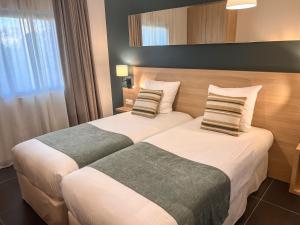 Hotels Hotel & Lodges Moby Dick : photos des chambres