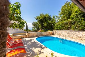 Mediterranean terrace with bbq, swimming pool and sea view