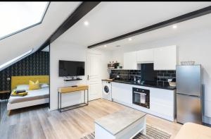 Appartements Bienvenue a Reims type studio charmant et lumineux 2 etage : photos des chambres