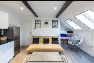 Appartements Bienvenue a Reims type studio charmant et lumineux 2 etage : photos des chambres