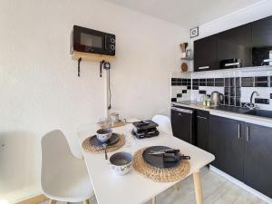 Joli studio rénové pour 4 pers. · Pied des pistes · Balcon sud-est - FR-1-344-1155