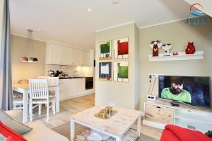 Haus Achterhus 213 - Wohnung 13 "rote Krabbe"