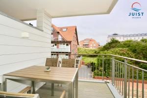 Haus Achterhus 214 - Wohnung 14 "blauer Anker"