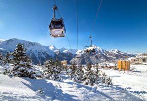 Appartements Studio vue montagne proche des pistes : photos des chambres