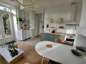 Appartement La verrerie, terrasse et jardinet