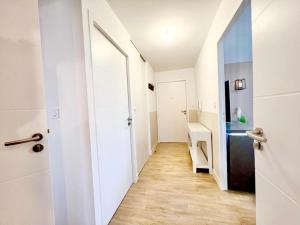 Appartements L'atelier Chic - Wifi fibre - Parking privee - Balcon - NETFLIX : photos des chambres