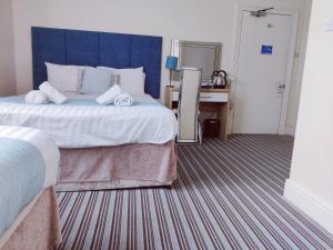 Standard Triple Room room in OYO Wentworth House Hotel