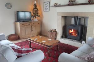 Maisons de vacances La Pommeraie, petite maison Normande : photos des chambres